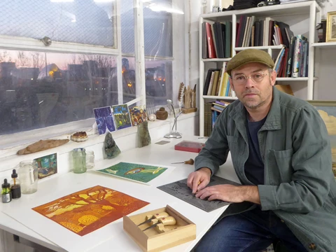 Kit Boyd At Desk Carving Lino